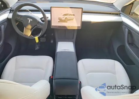 2023 Tesla Model Y from USA, damaged, VIN 7SAYGDEE2PA085770